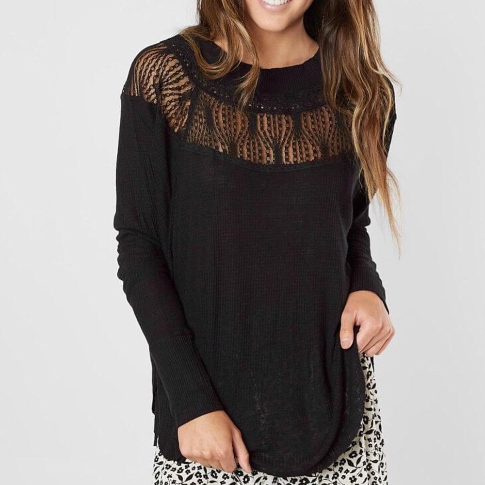 Black free people sweater with cool cut outs!